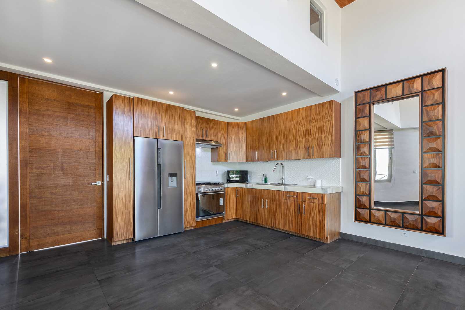 Luxury in-suite kitchen and dining area inside Villa Hurakán