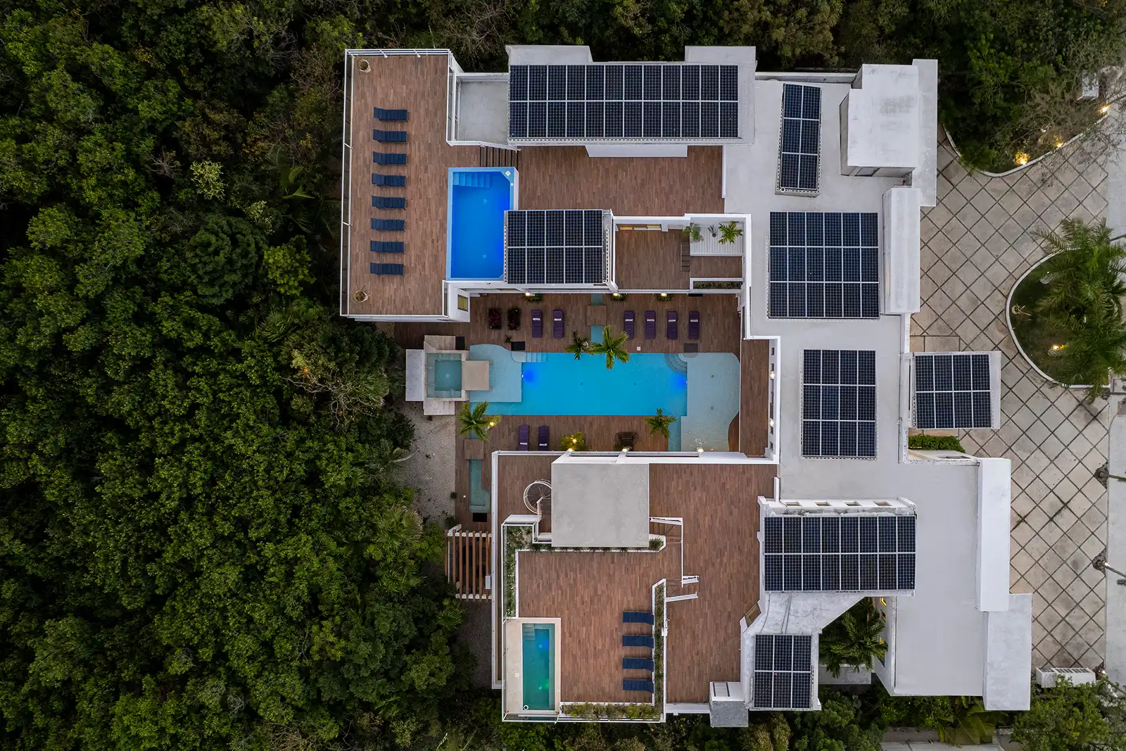 Top-down aerial view of Villa Hurakán showing pools and tropical estate layout