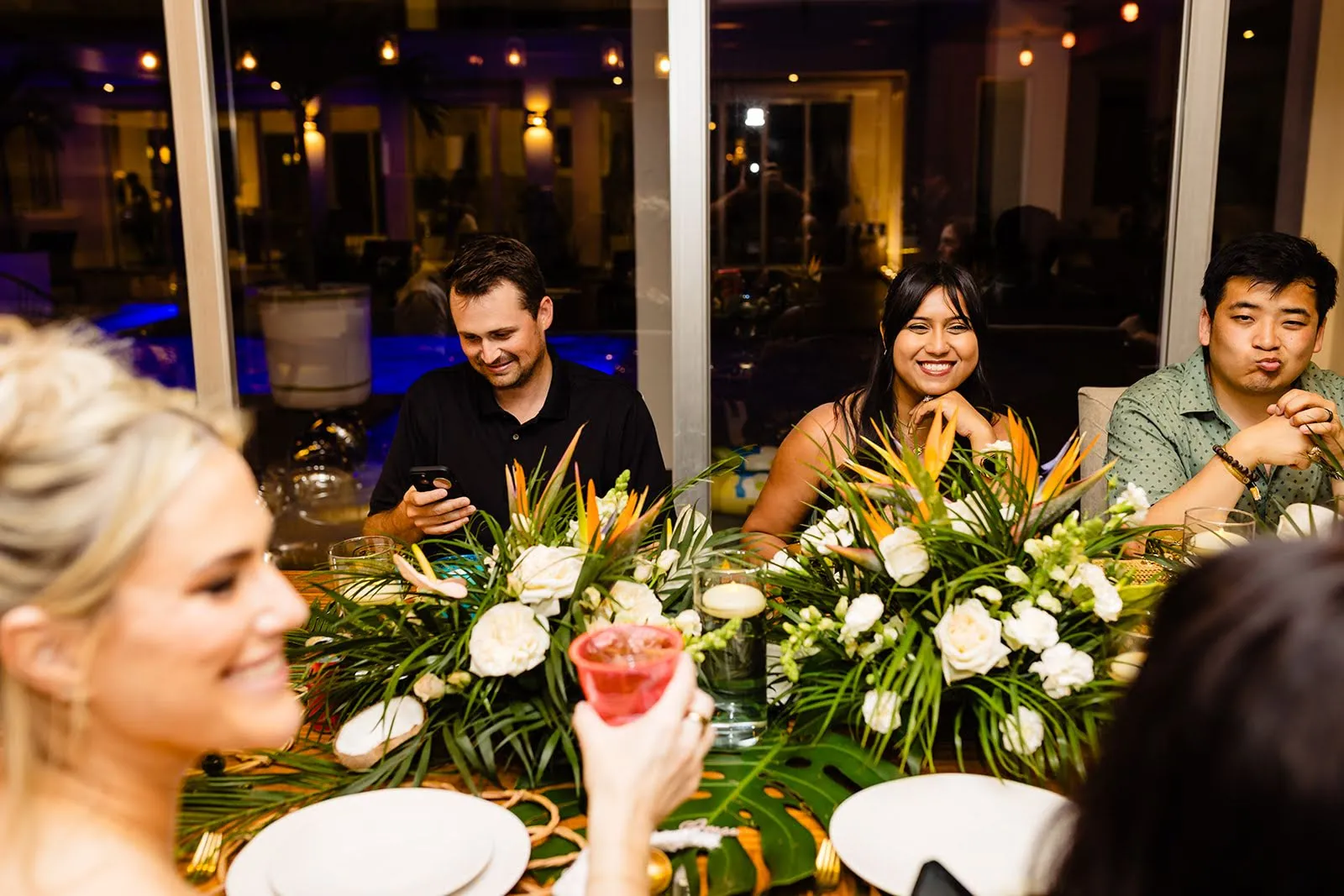 Luxury wedding dinner reception with candlelit tropical table decor at Villa Hurakán
