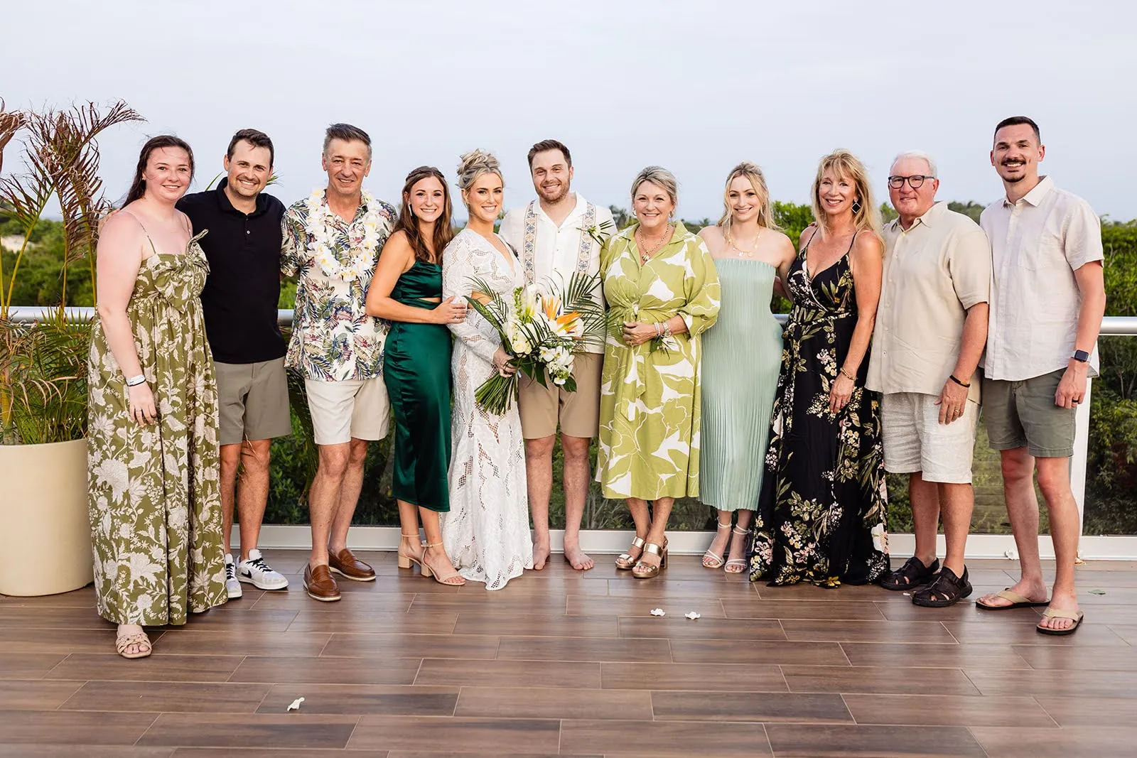 Group wedding portrait with family and guests at Villa Hurakán