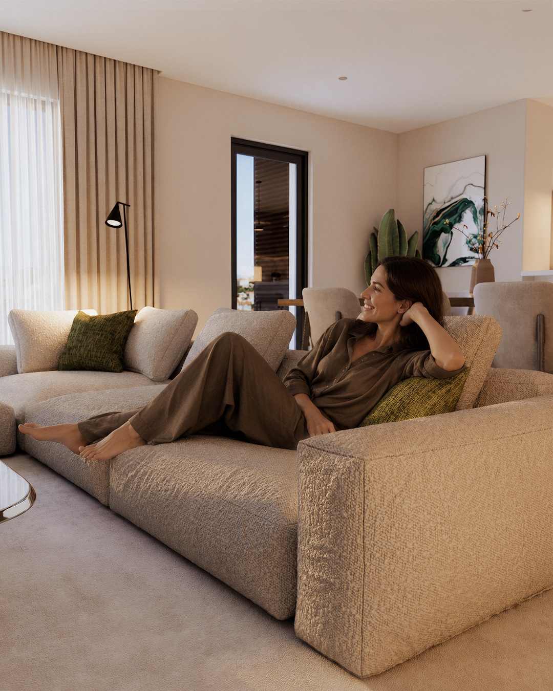 Aurea Residences sofa with woman