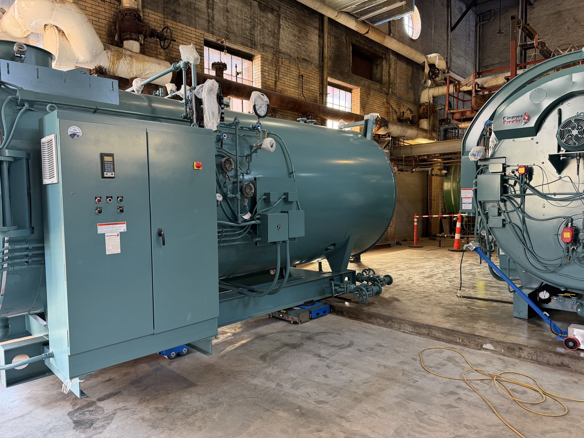 Industrial boiler set inside mechanical room
