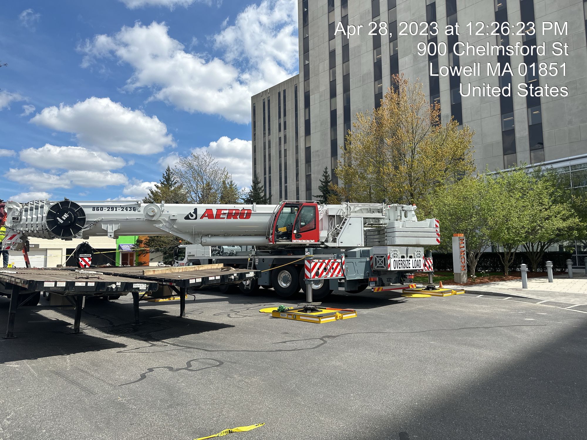 Aero Crane outrigger setup at Lowell commercial building site