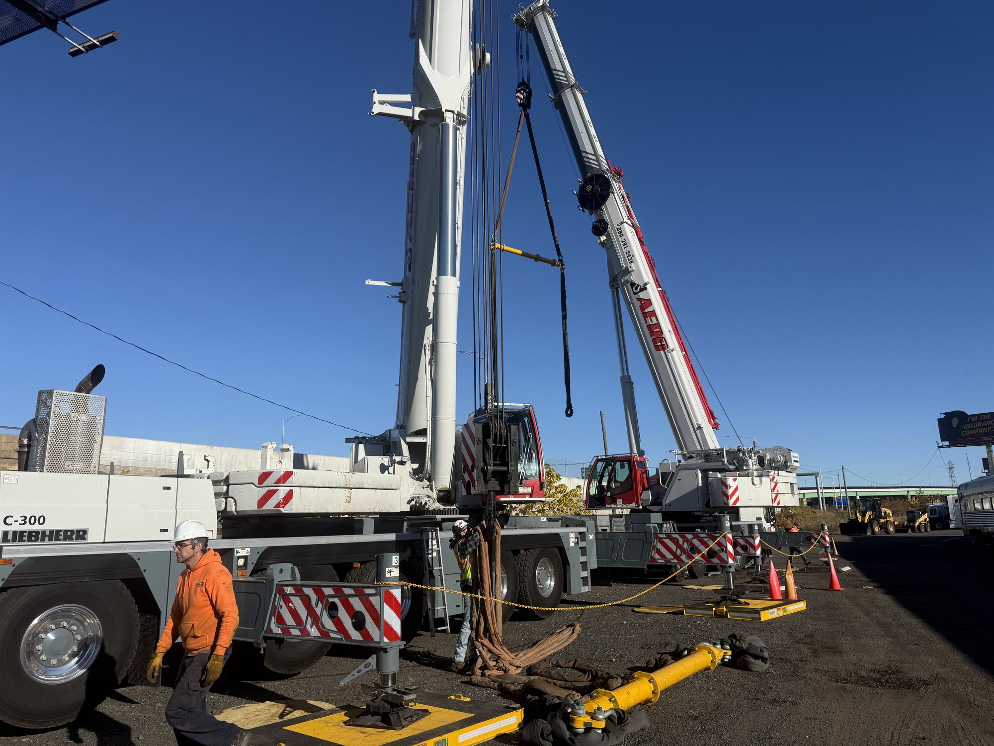 Aero Crane lifting highway sign structure into place