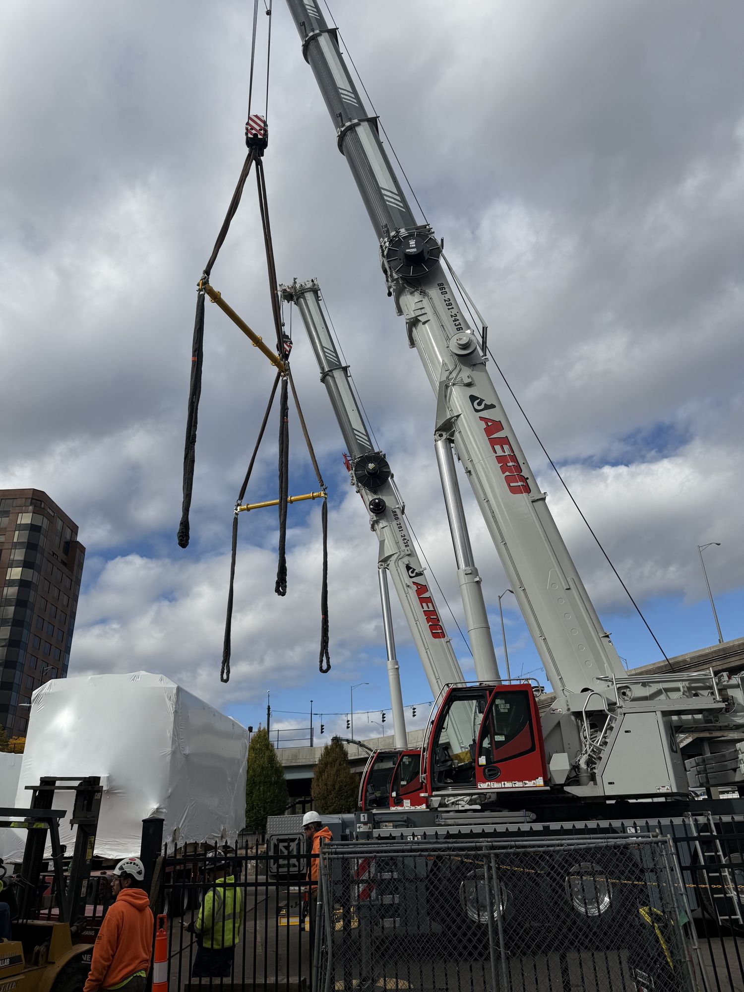 Aero Crane Service performing power plant equipment lift