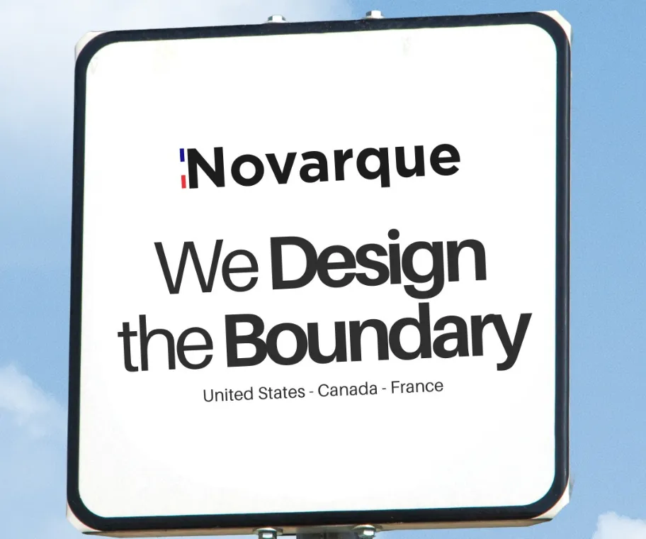 Sign with text 'Novarque We Design the Boundary United States - Canada - France' against a blue sky.