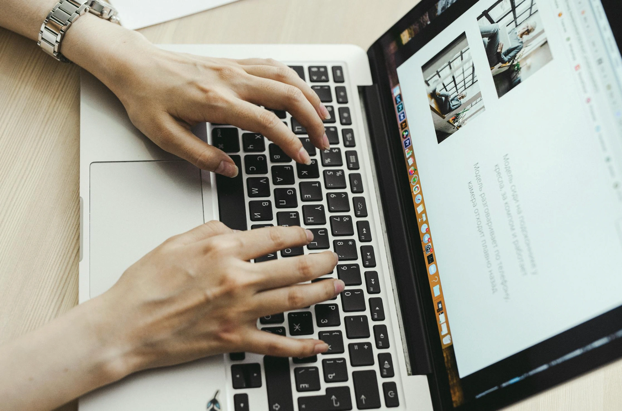 woman typing on laptop