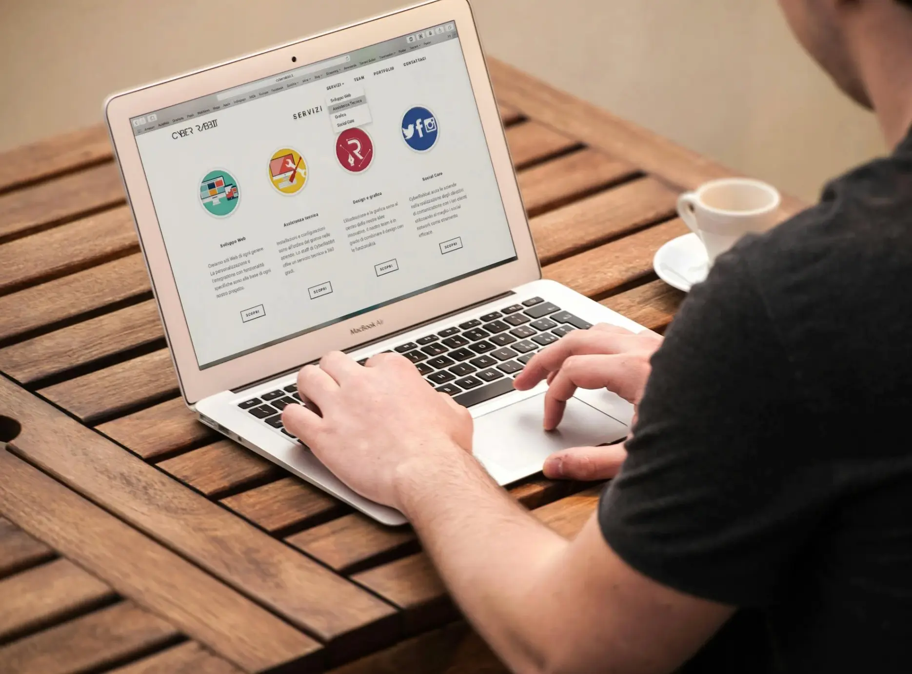 person exploring site on macbook