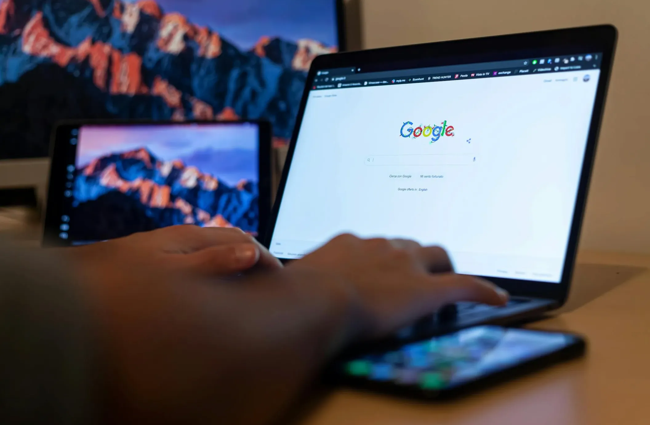 Person typing on Google