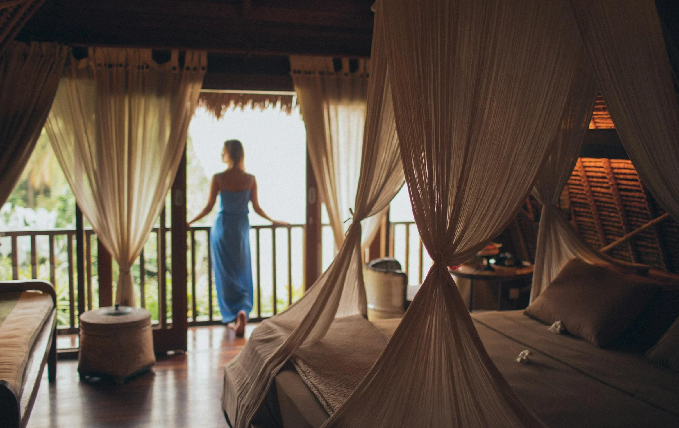 woman looking out hotel view