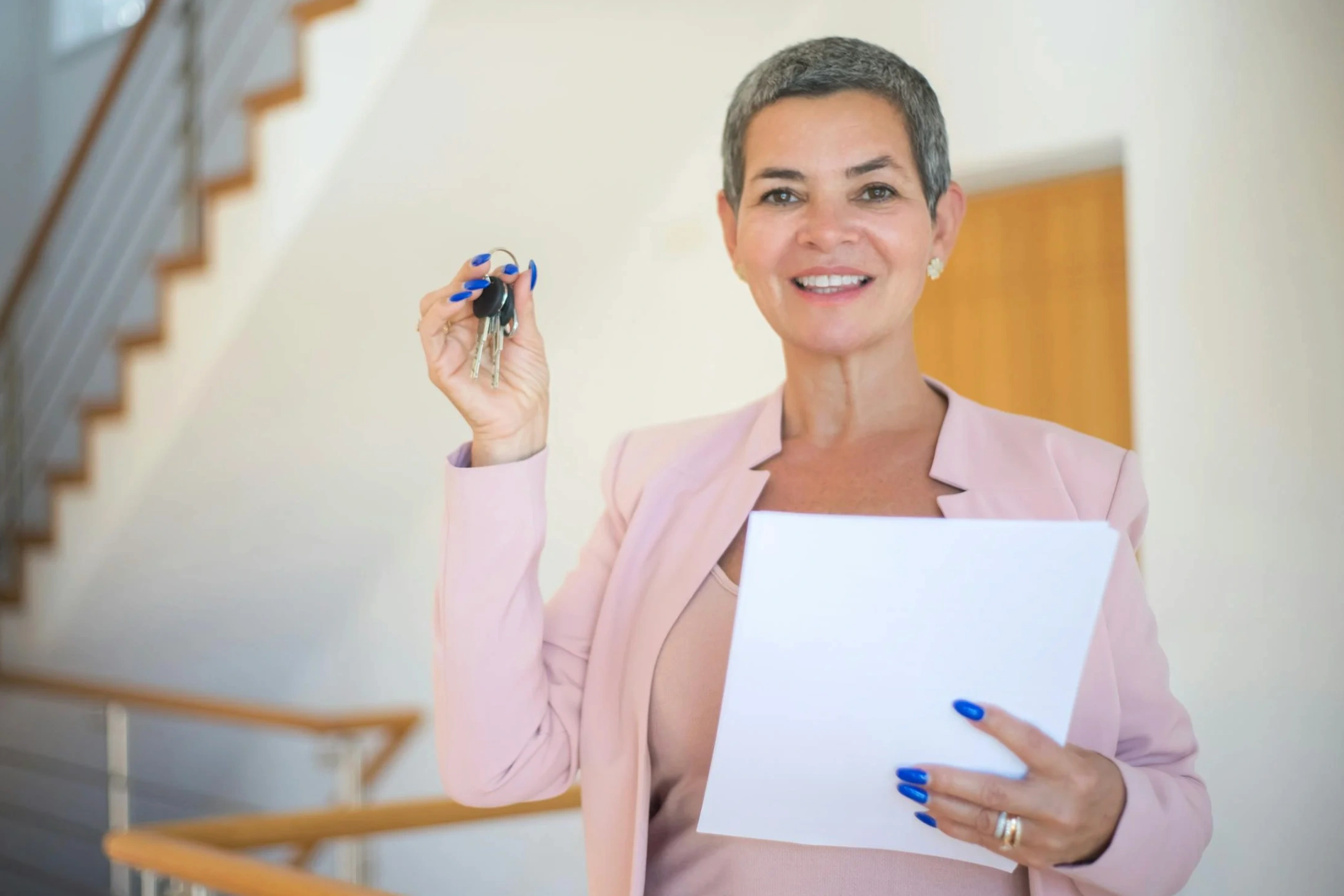 real estate agent holding house key
