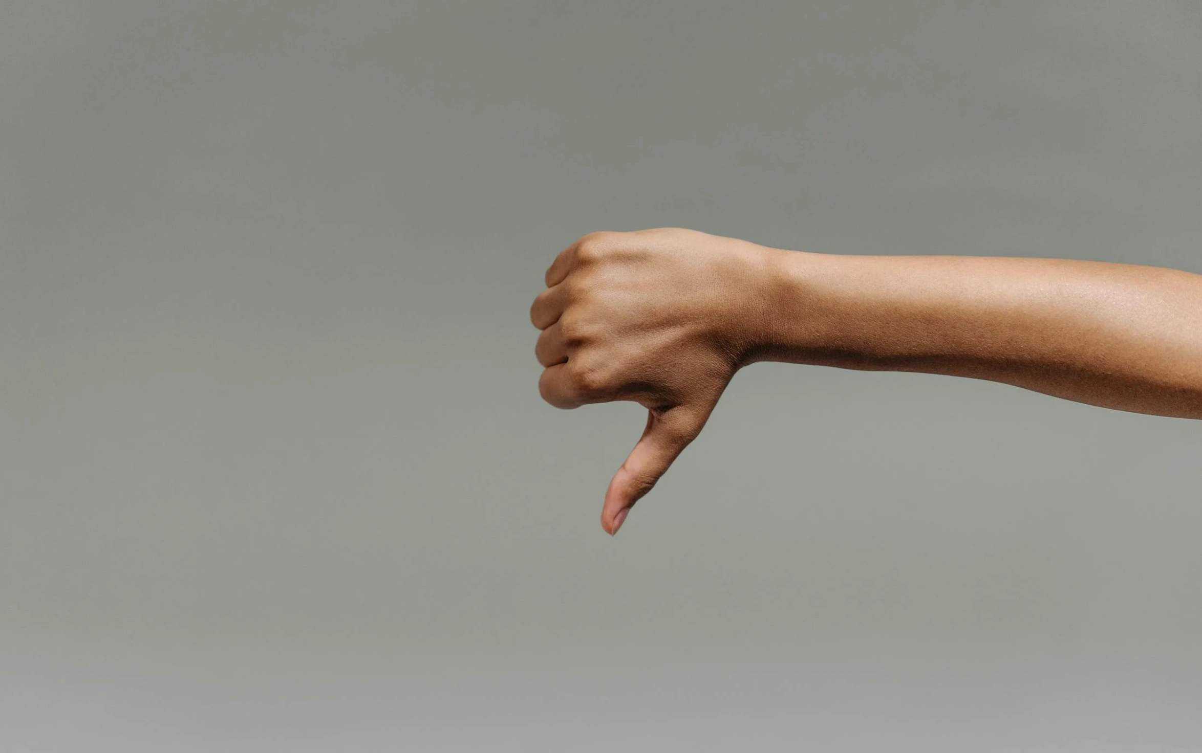 image of person doing a thumbs down
