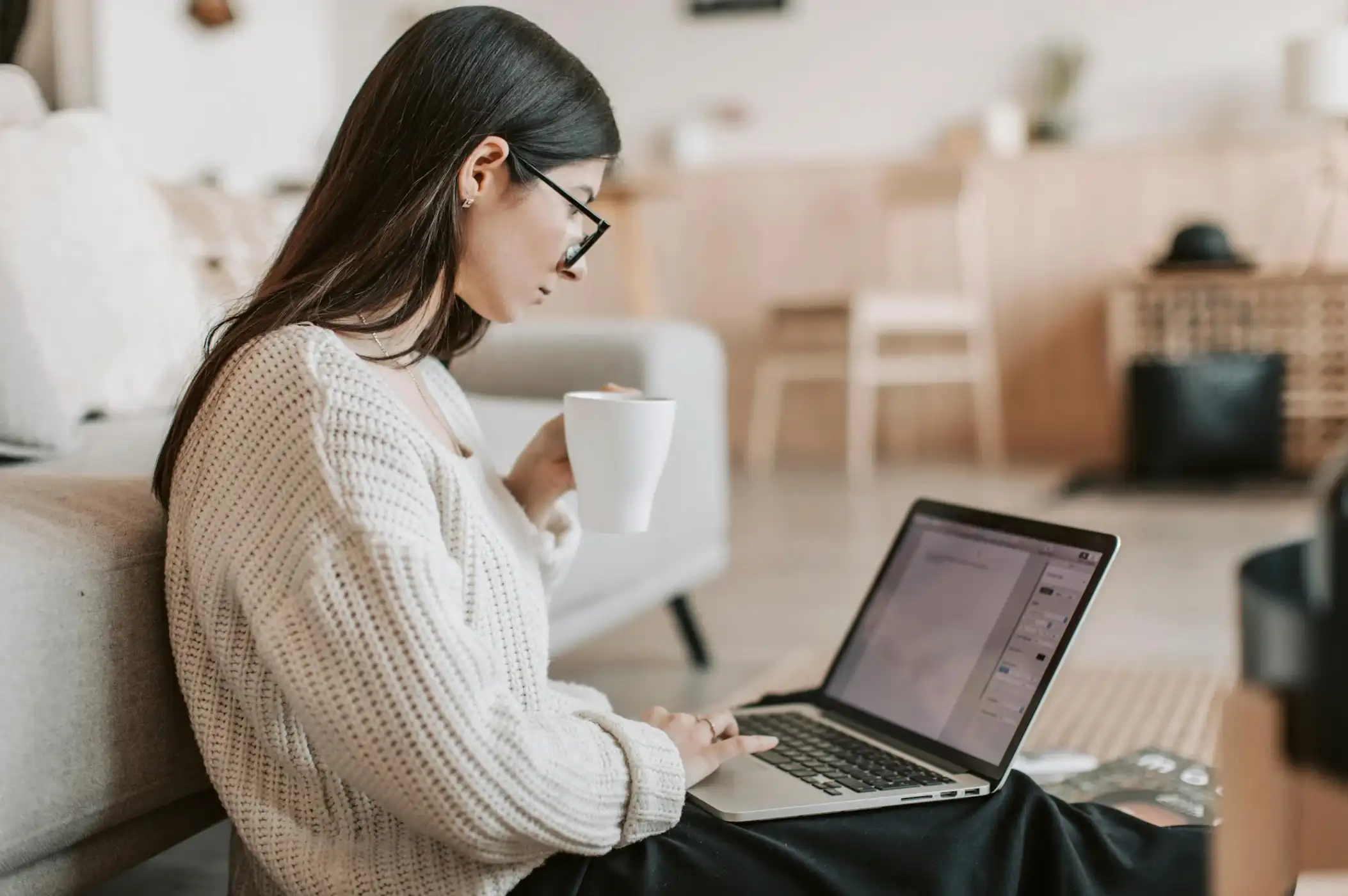woman looking at laptop