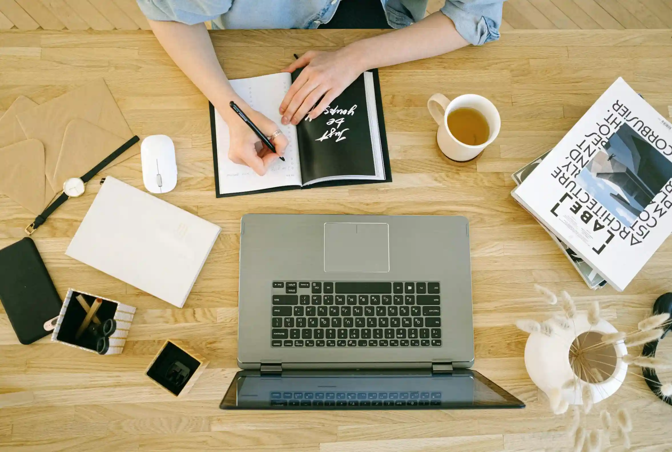 women writing in plannner