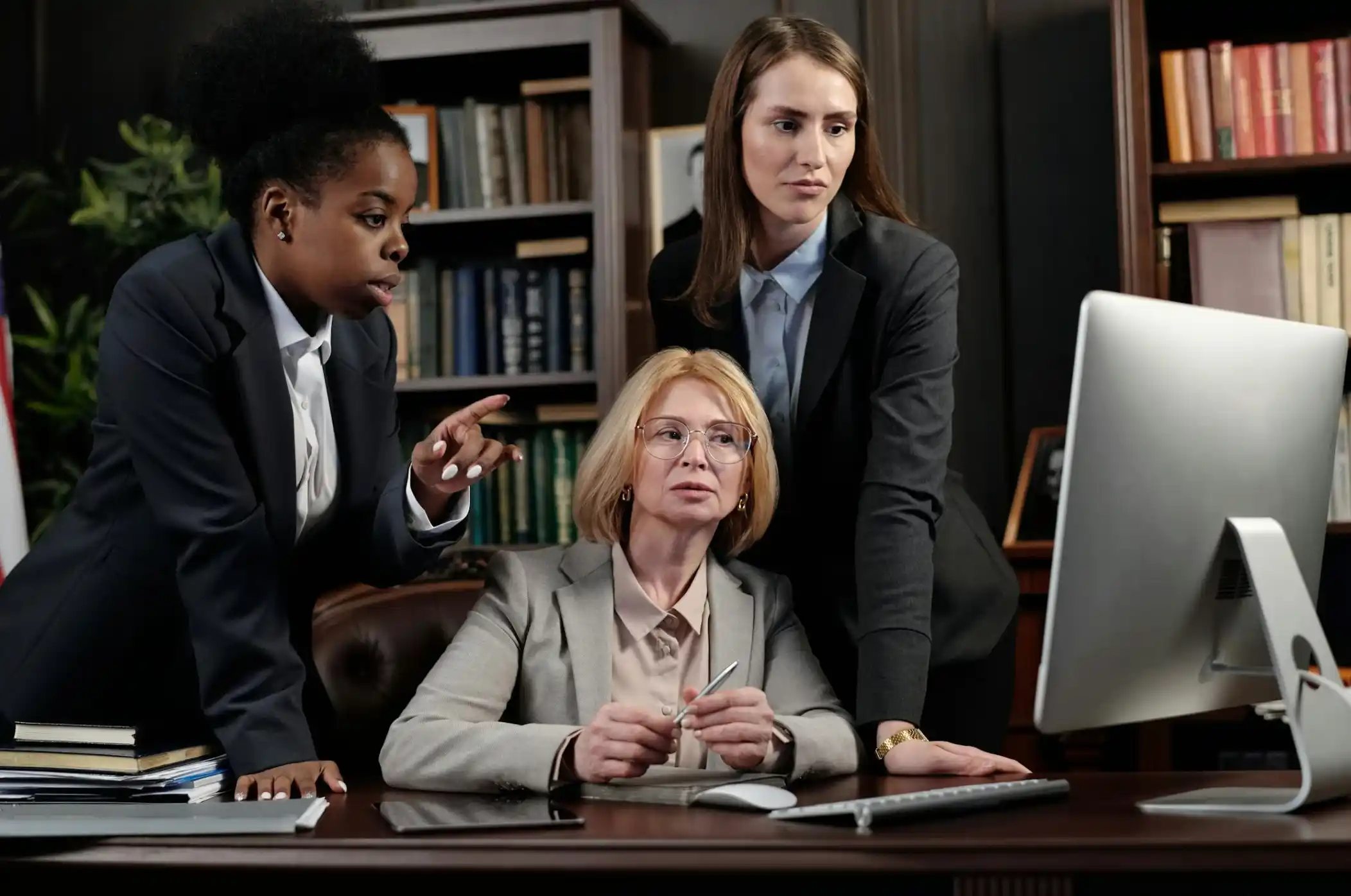 lawyers looking at computer