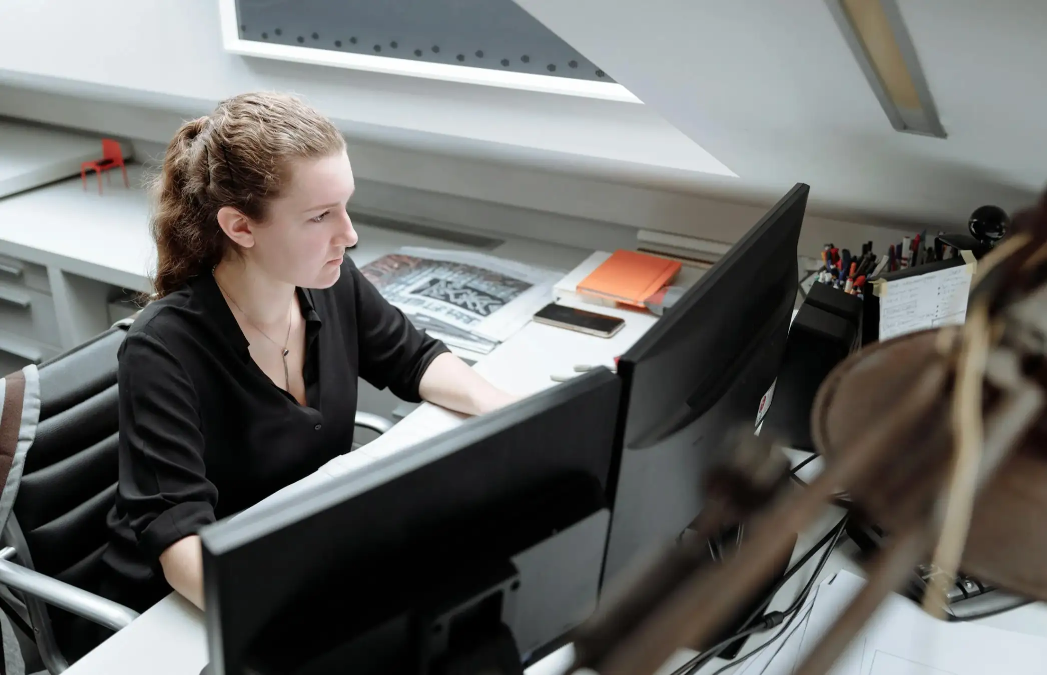 A Woman Using a Desktop Computer