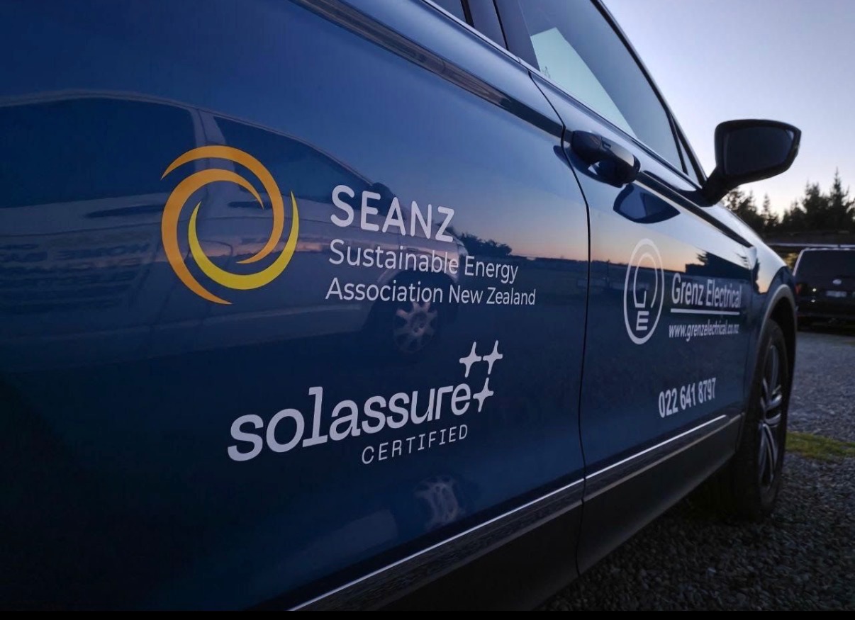 A Solassure certified installer’s vehicle with the Solassure Certified mark on the side panel