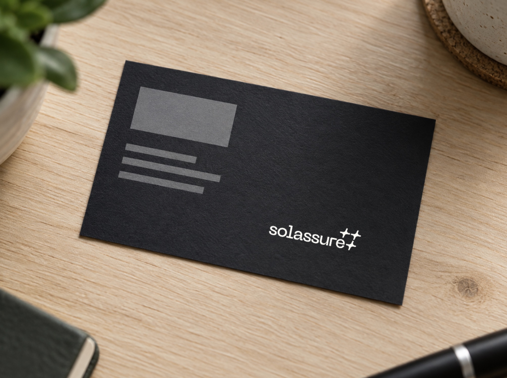 Business card and email signature carrying the Solassure Certified mark