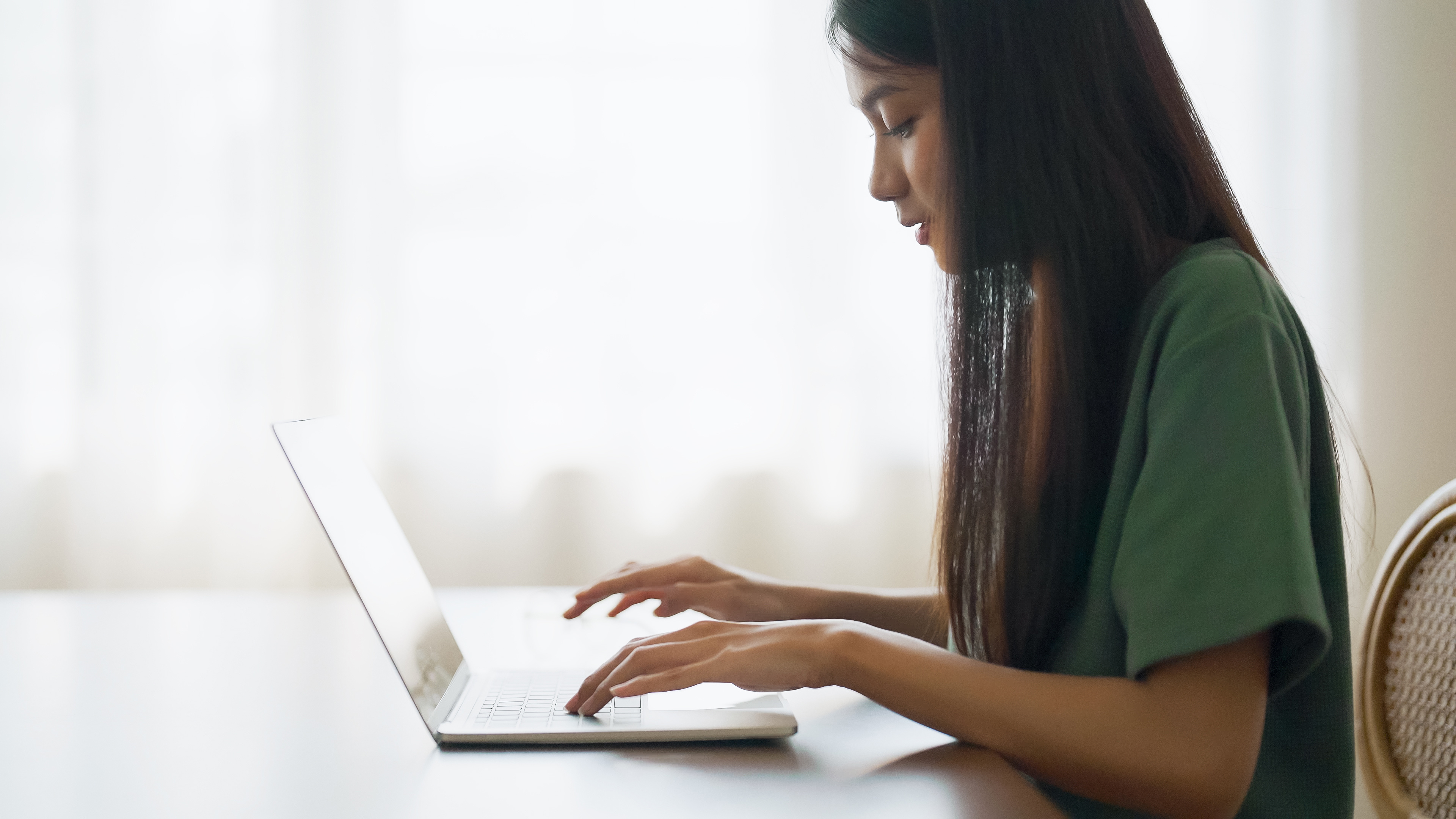 Woman on laptop stock photo
