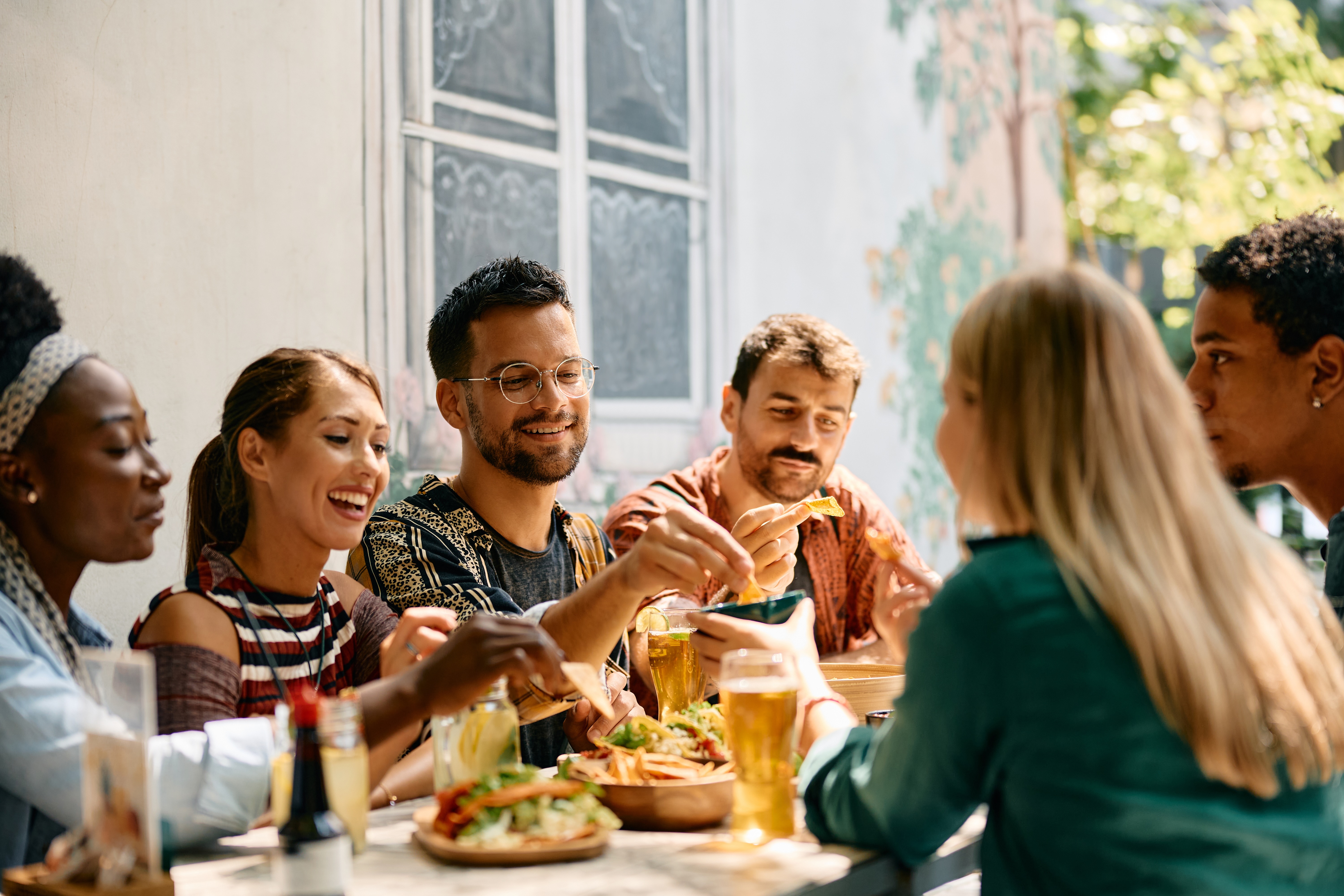 Friends eating stock photo