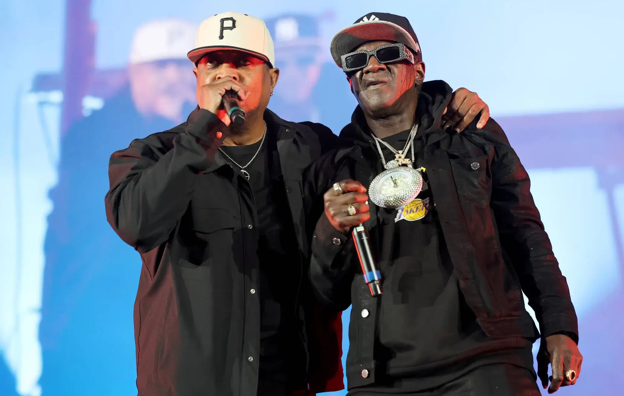 Chuck D and Flavor Flav of Public Enemy perform onstage during Jelly Roll & Friends: A Concert For All First Responders at Rose Bowl Stadium on February 01, 2025 in Pasadena, California. (Photo by Amy Sussman/Getty Images for Jelly Roll)