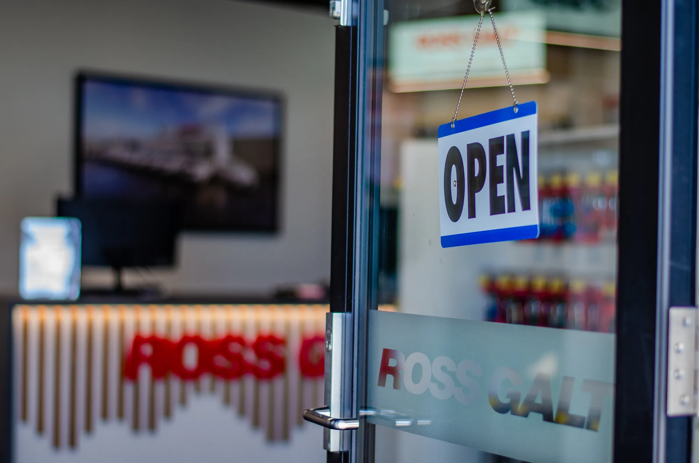 Open sign at the Ross Galt showroom entrance