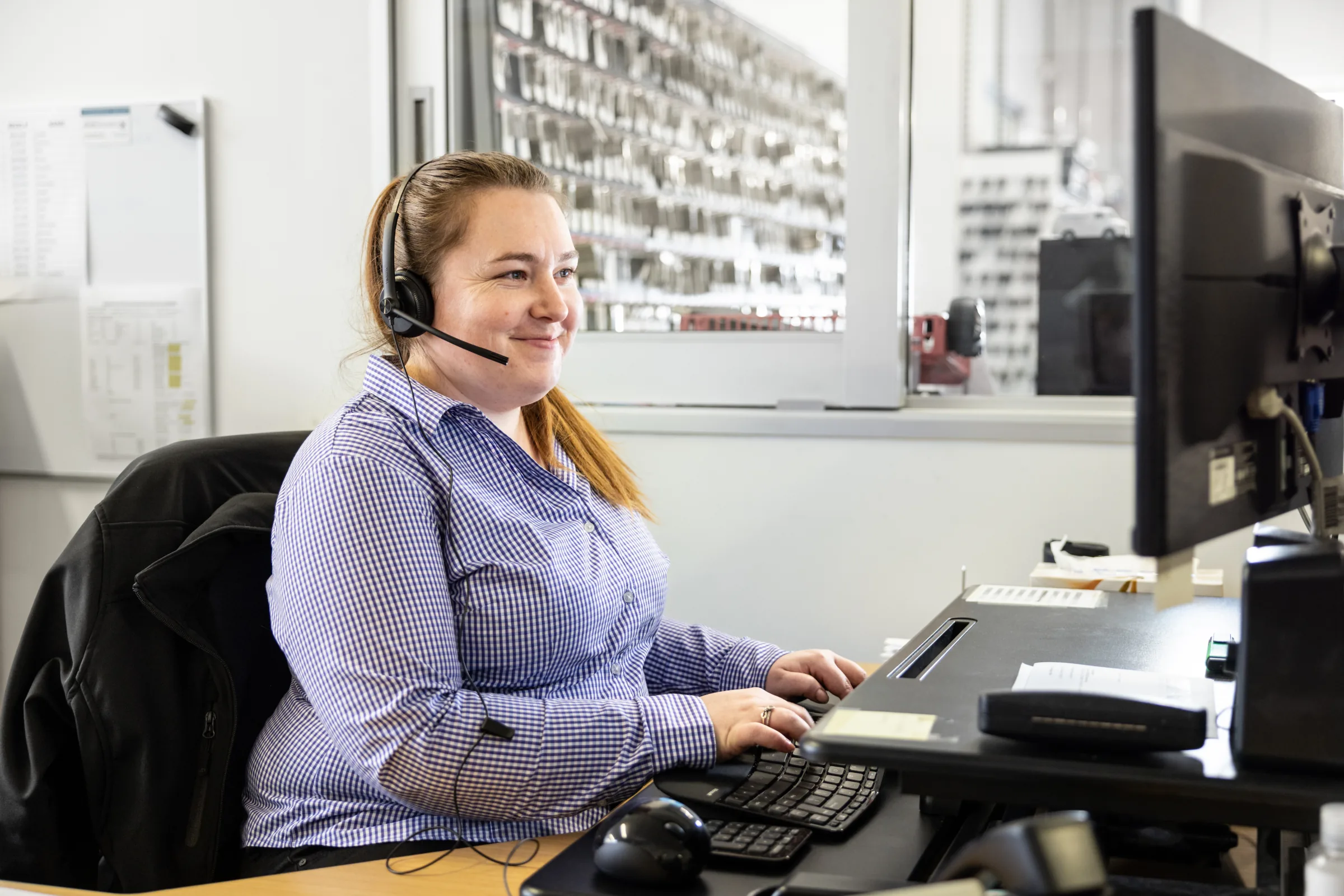 Ross Galt customer service team member at her desk