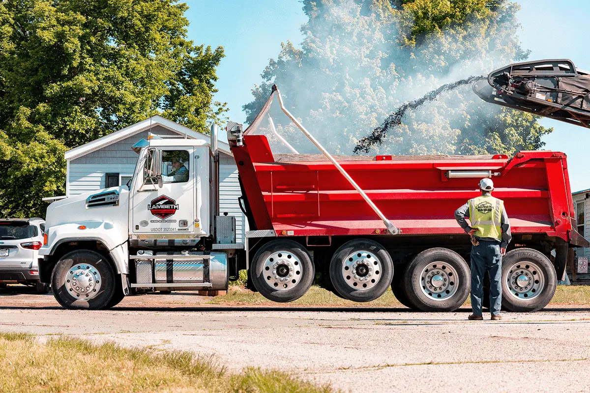 Branded commercial truck representing a founder-built business success story