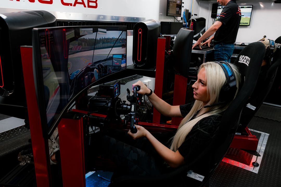 Customer using a racing simulator at Apex Racing Lab