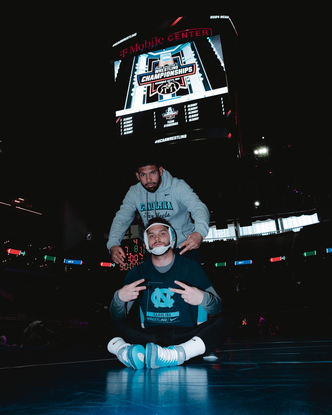 UNC Wrestling athlete entering the arena during a team event
