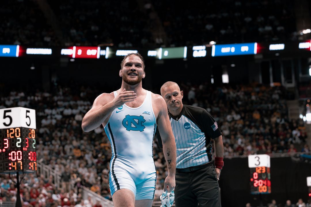 UNC Wrestling athlete competing in a collegiate wrestling match