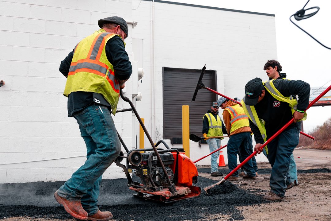 Lambeth Asphalt Services crew working on an asphalt paving project