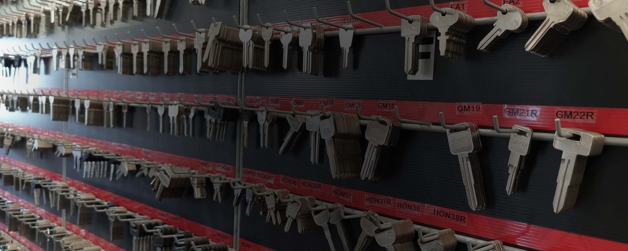 Key blanks displayed on the Ross Galt locksmith wall