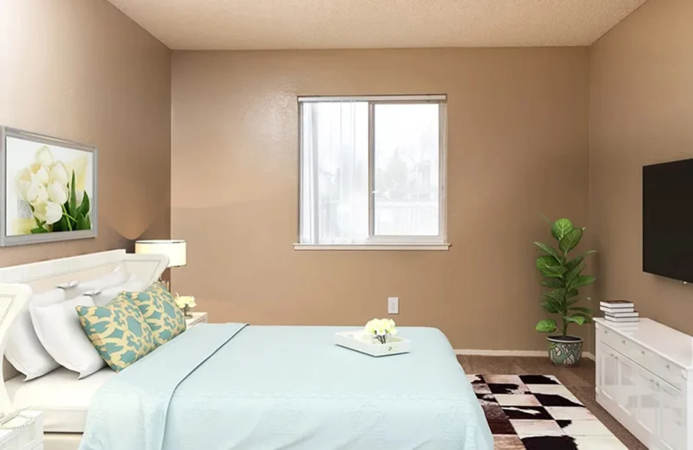 Bedroom with staged furniture