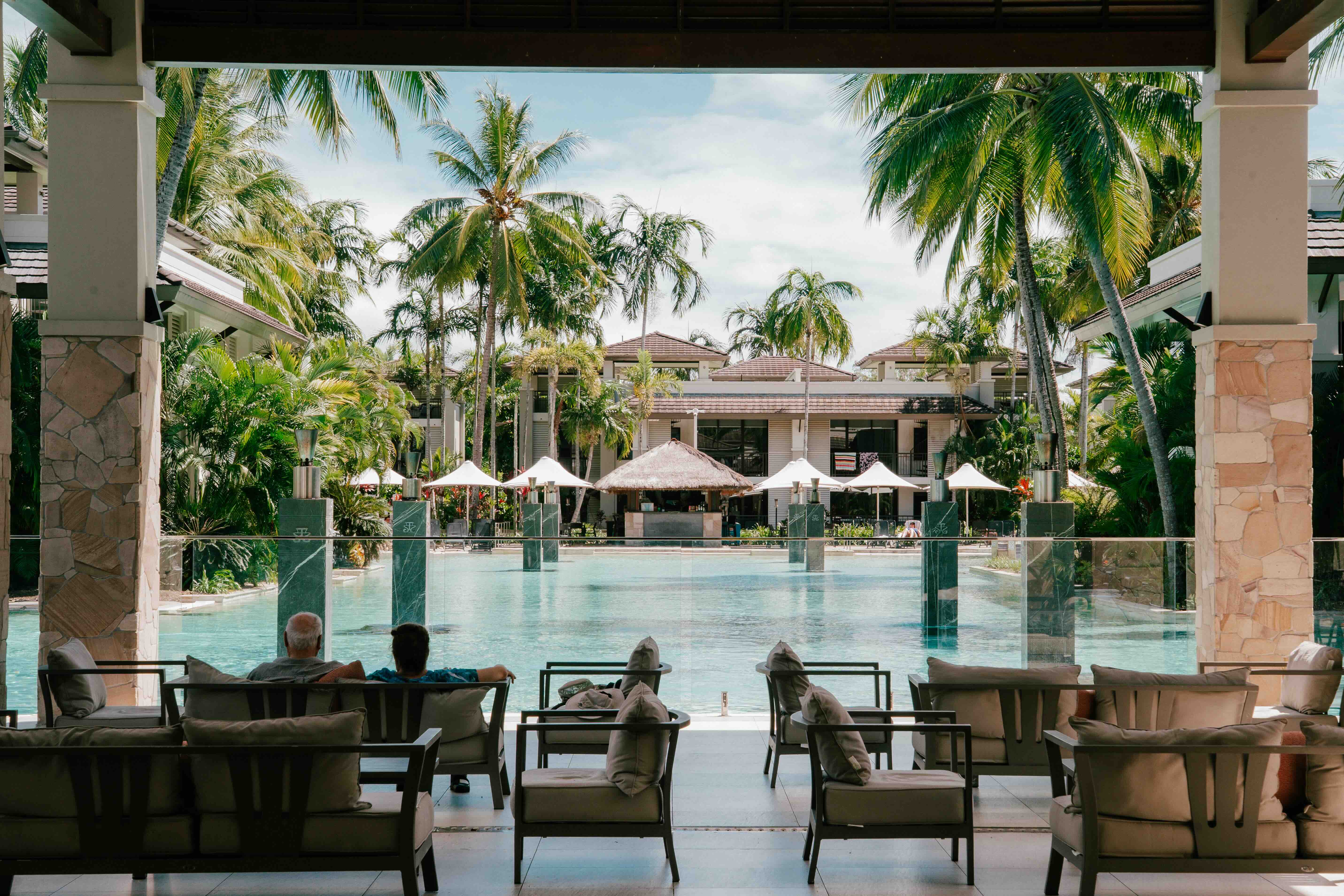 Poolside dining terrace at Aluco Restaurant & Bar, Pullman Port Douglas