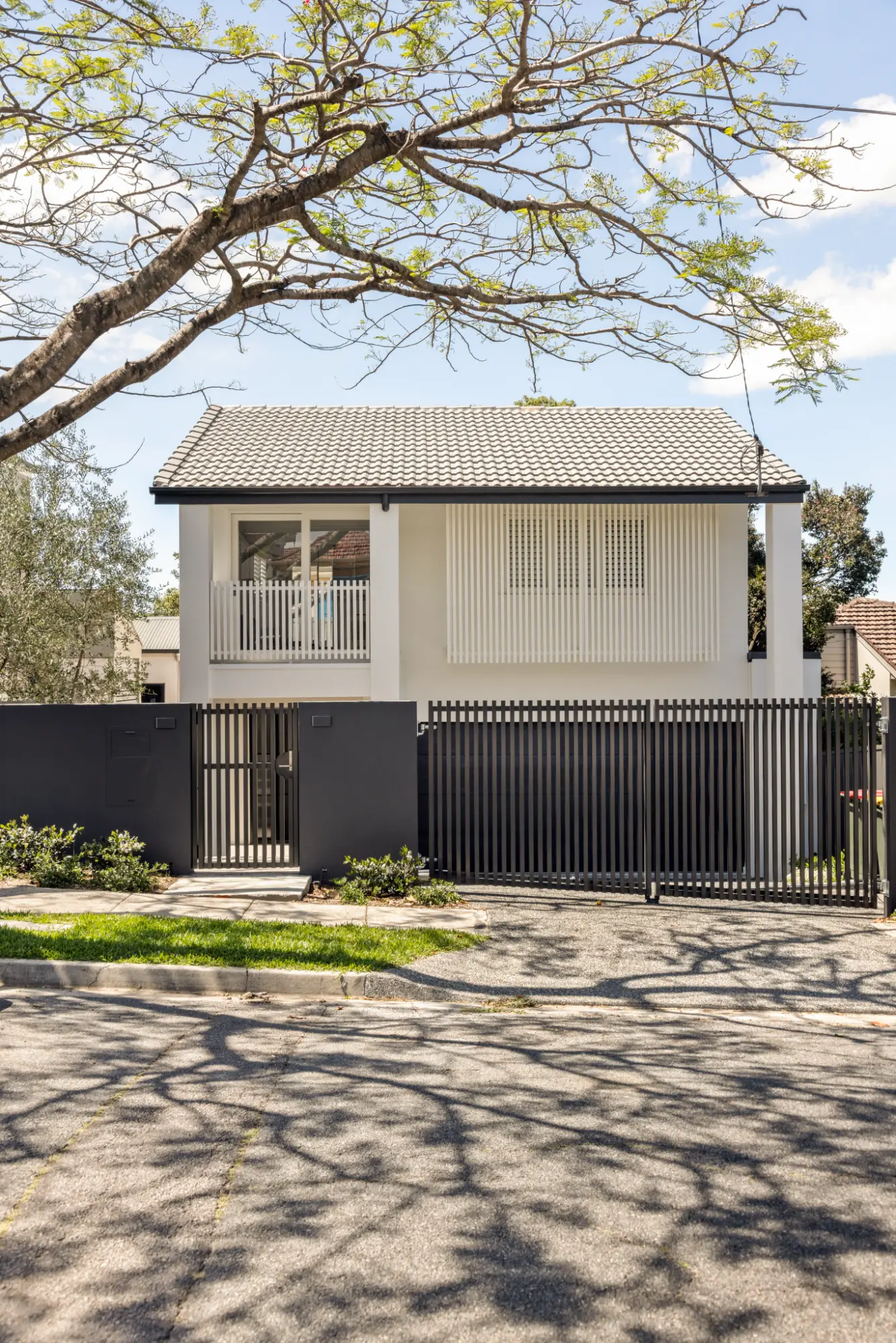 Modern residential home exterior with minimalist architecture and contemporary facade in a high-end Brisbane project.