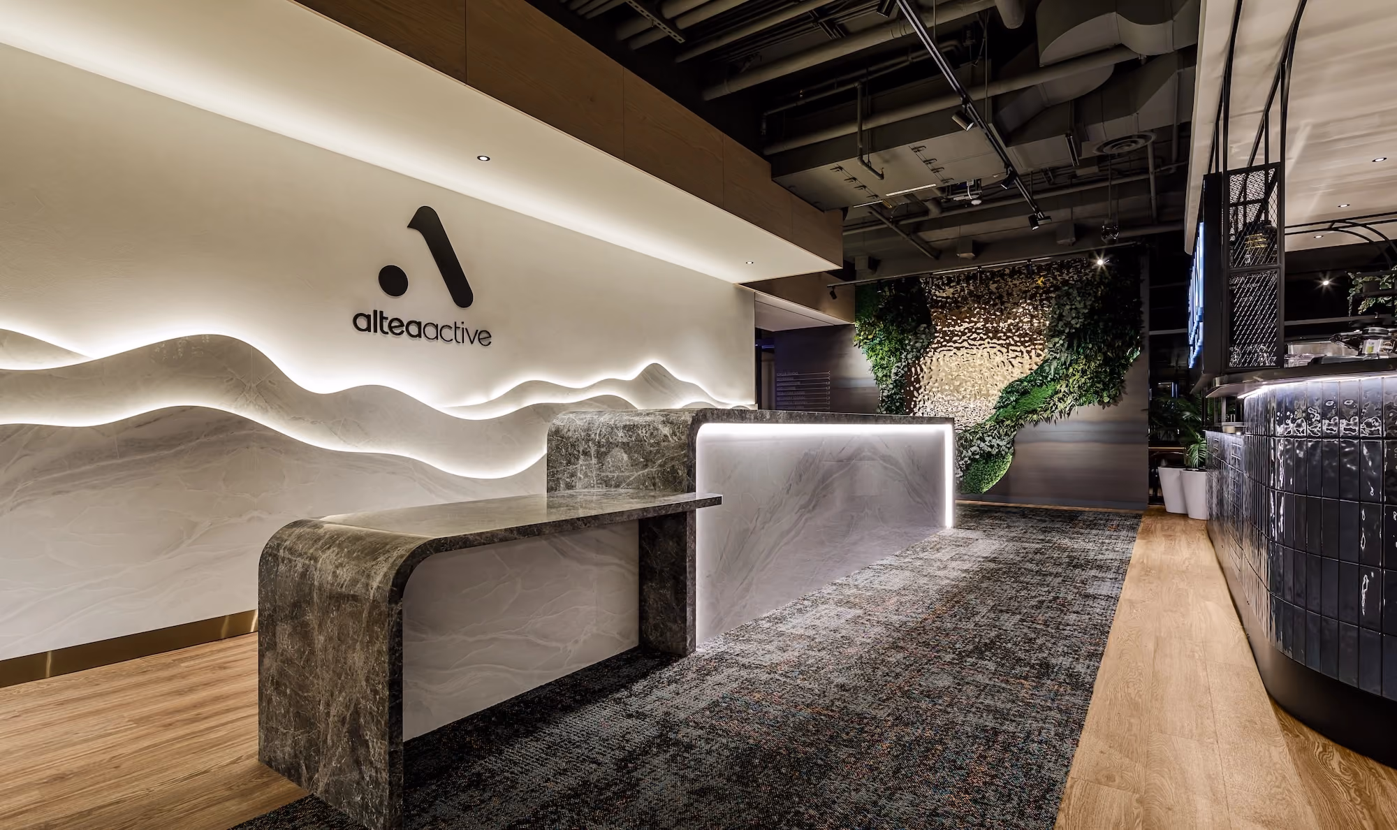 Altea club reception interior with branded wall and front desk