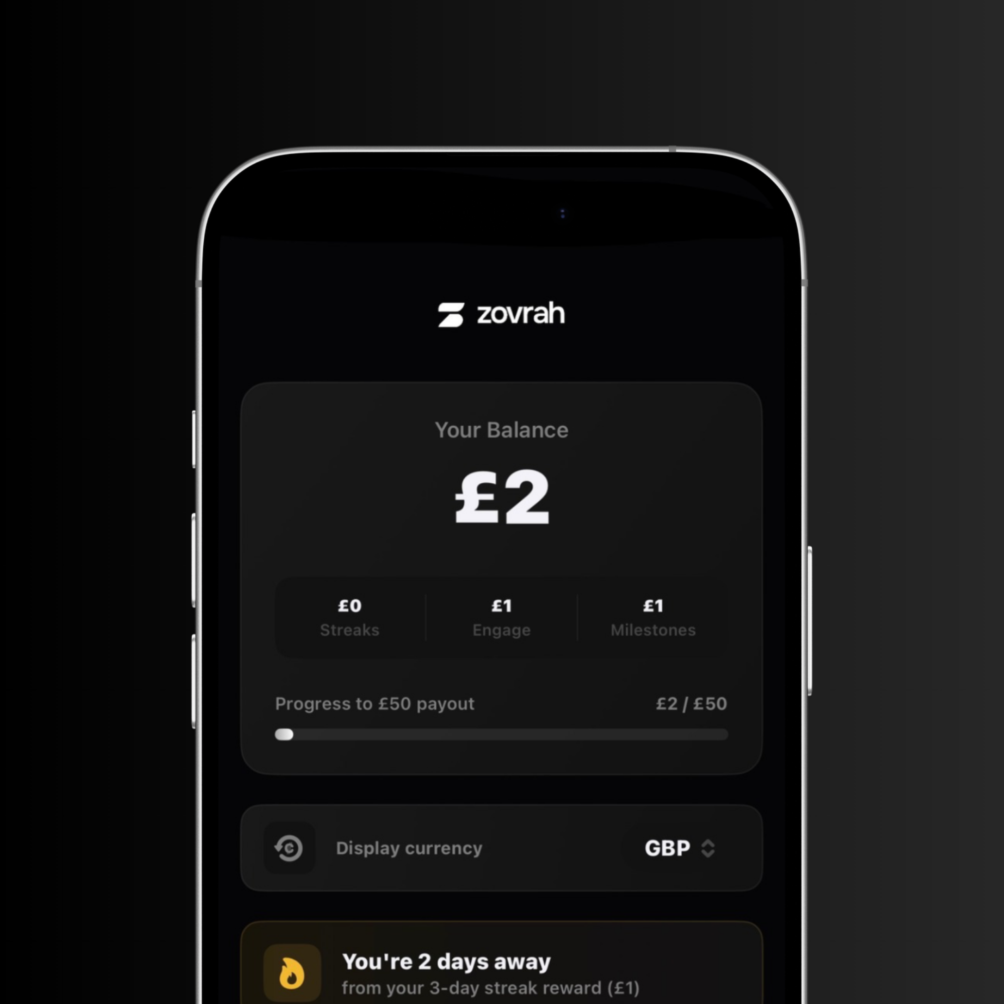 Mobile phone screen showing Zovrah app balance of £2 with progress bar towards £50 payout and currency set to GBP.