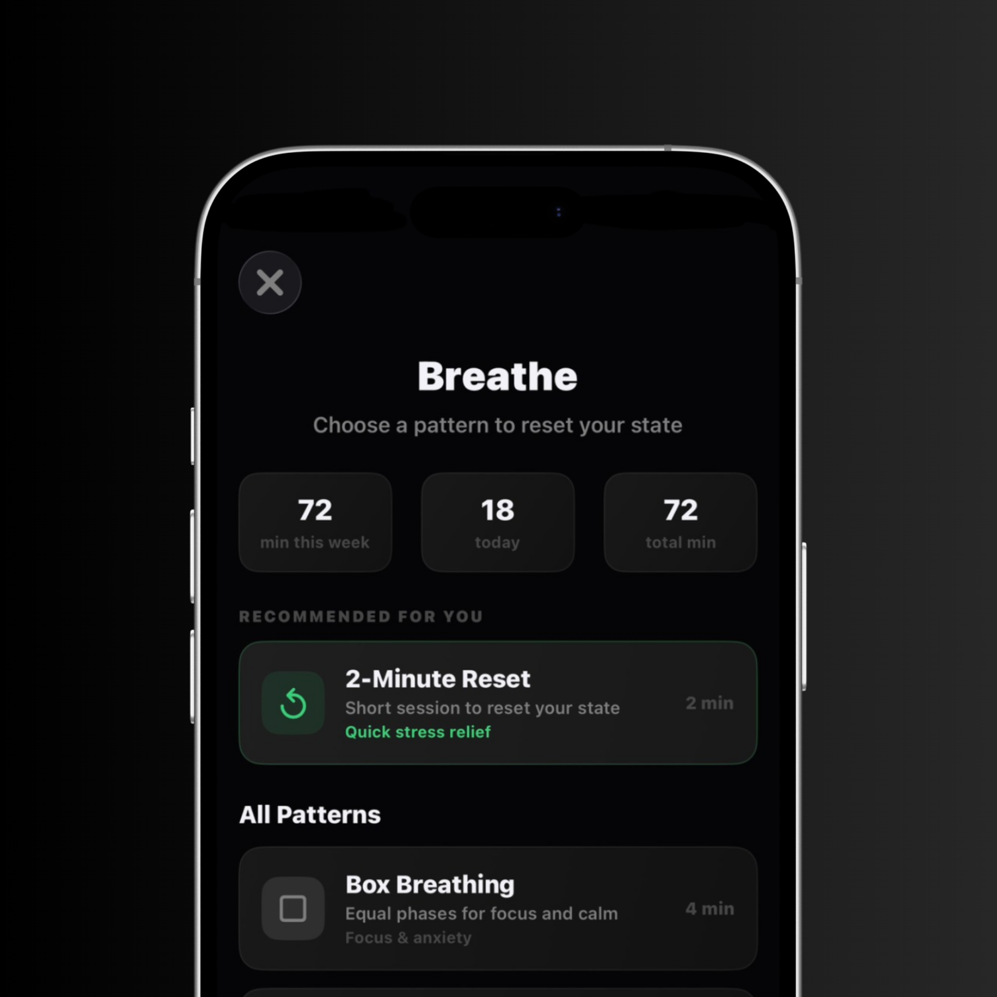 Mobile app screen titled Breathe showing breathing patterns with weekly, daily, and total minutes; recommended 2-Minute Reset for quick stress relief and a Box Breathing pattern for focus and calm.
