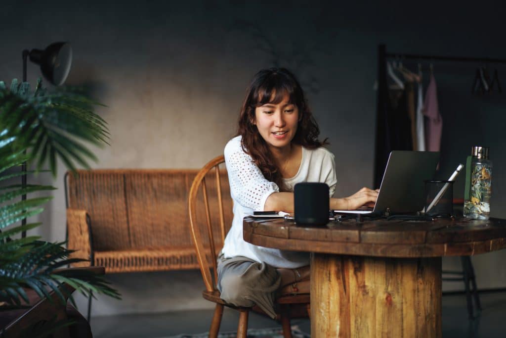 woman-working-with-smart-speaker