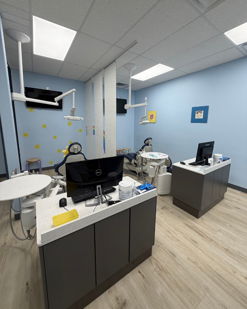 image of a dentist with a patient in a dental office