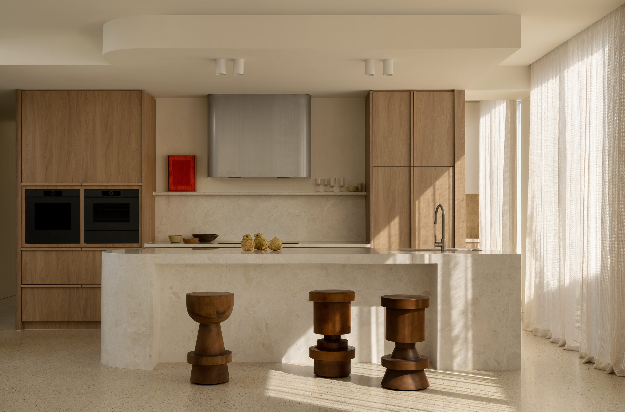 Master ensuite with stone finishes and understated fixtures, Brighton Restoration