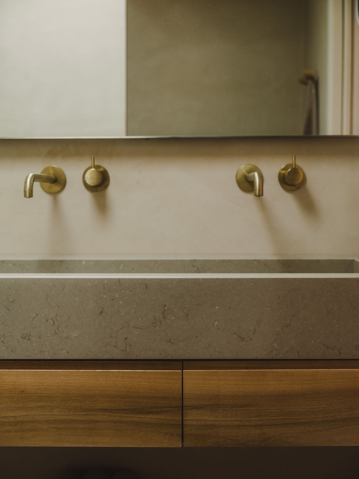 Bathroom with stone trough basin and aged brass tapware, Casa M