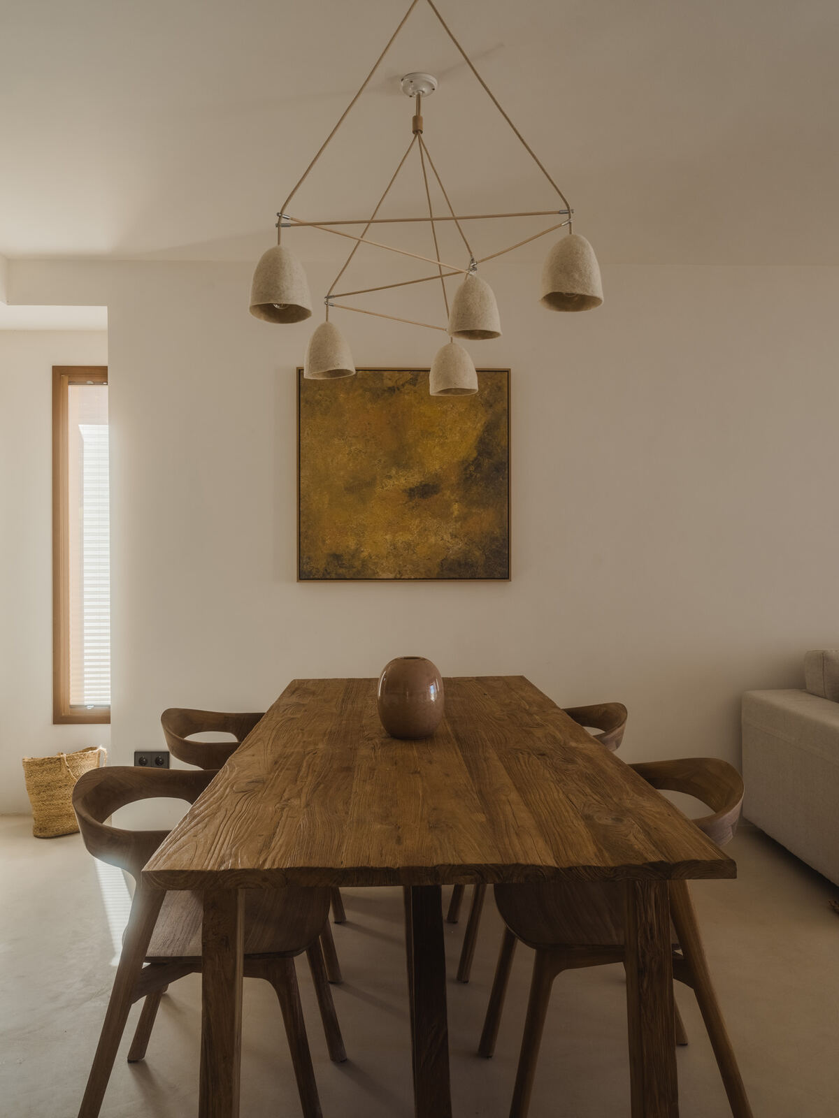 Dining room with timber table and sculptural plaster chandelier, Casa M