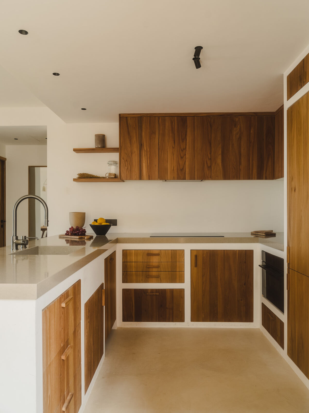 Kitchen with timber cabinetry framed in soft white, Casa M