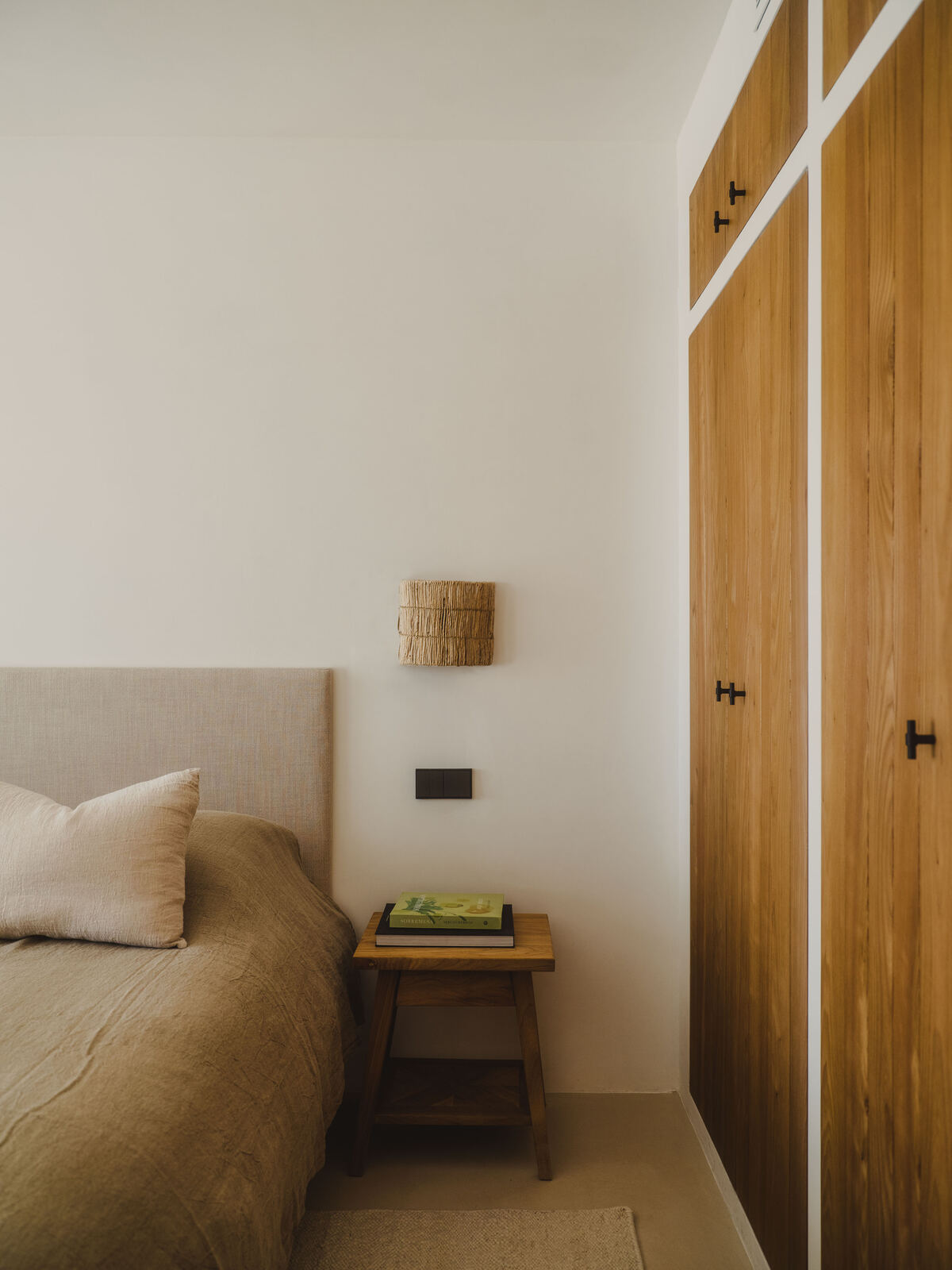 Bedroom with linen bedhead and built in timber wardrobe, Casa M