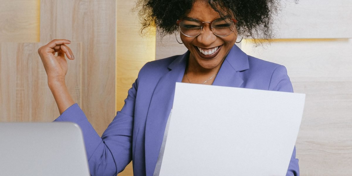 Photo of a confident professional smiling, symbolizing career success and achievement after gaining valuable certifications.