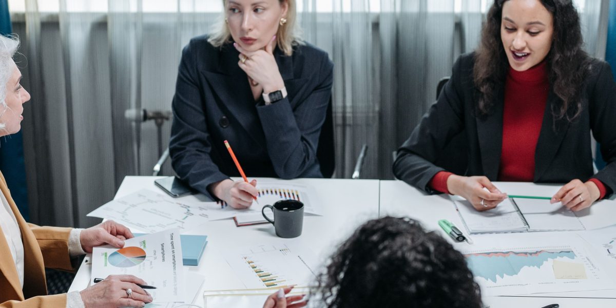 Leaders in a collaborative setting, symbolizing the commitment required from executive leadership to establish a culture of data ethics and future-proof their organization.