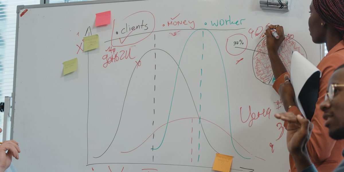 A diverse team collaboratively discussing ethical guidelines and frameworks to ensure the responsible development of AI assistants.