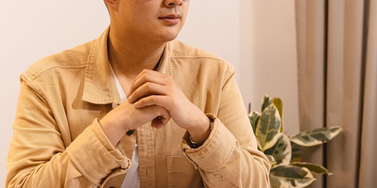A person thoughtfully considers their career path, reflecting on finding a remote AI role that aligns with ethical values and integrity.